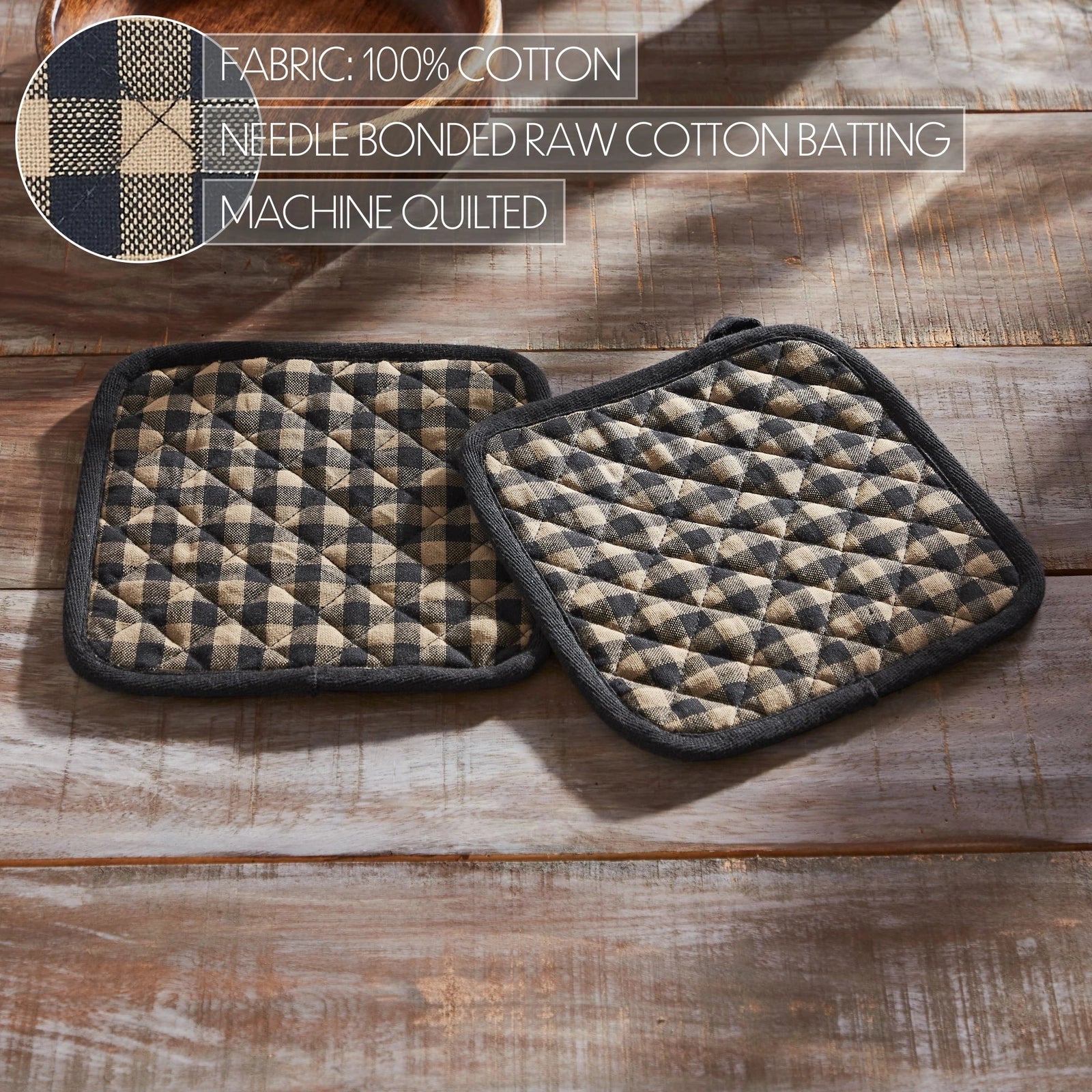 Two quilted cotton pot holders with a beige and dark gray buffalo plaid pattern, displayed on a rustic wooden surface. A circular fabric detail inset and text overlays specify the materials and construction.