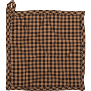 Brown and black checkered fabric square with a visible brand label.